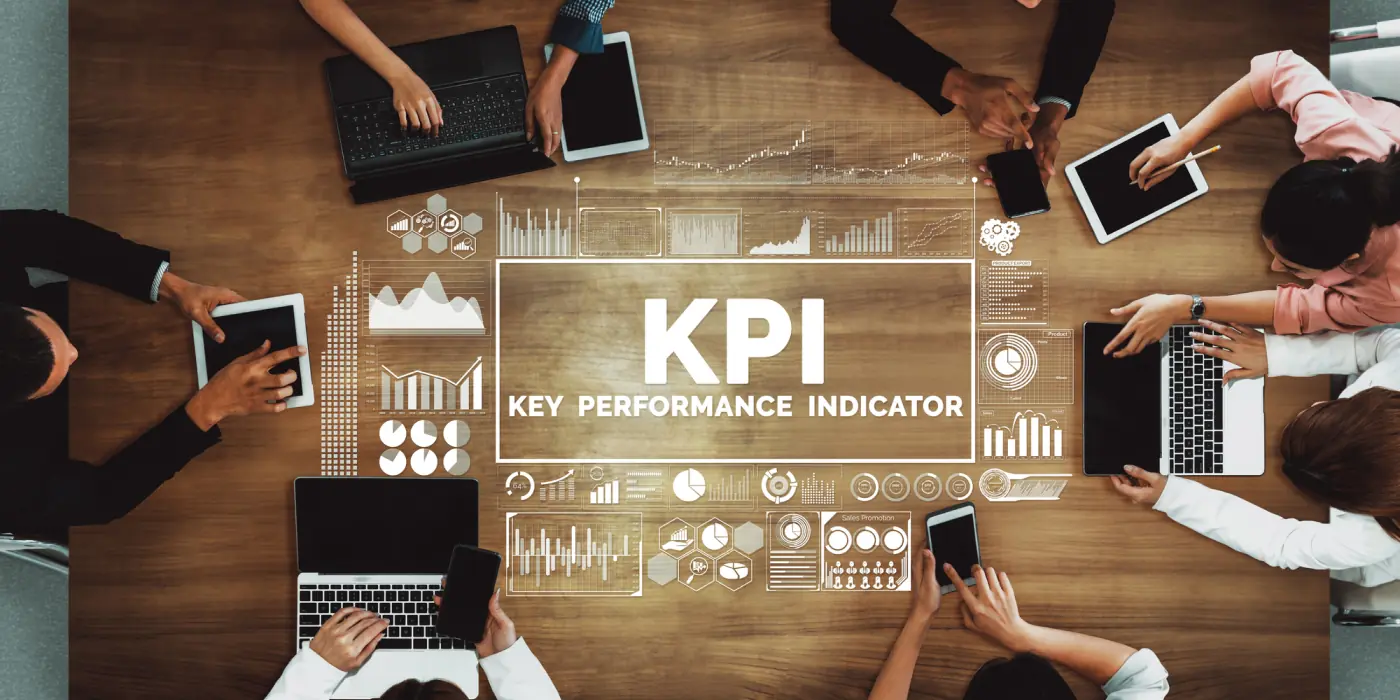 how-to-avoid-common-pitfalls-when-outsourcing-logistics-to-3pls Team analyzing KPI dashboards to monitor 3PL performance, integration, and scalability.