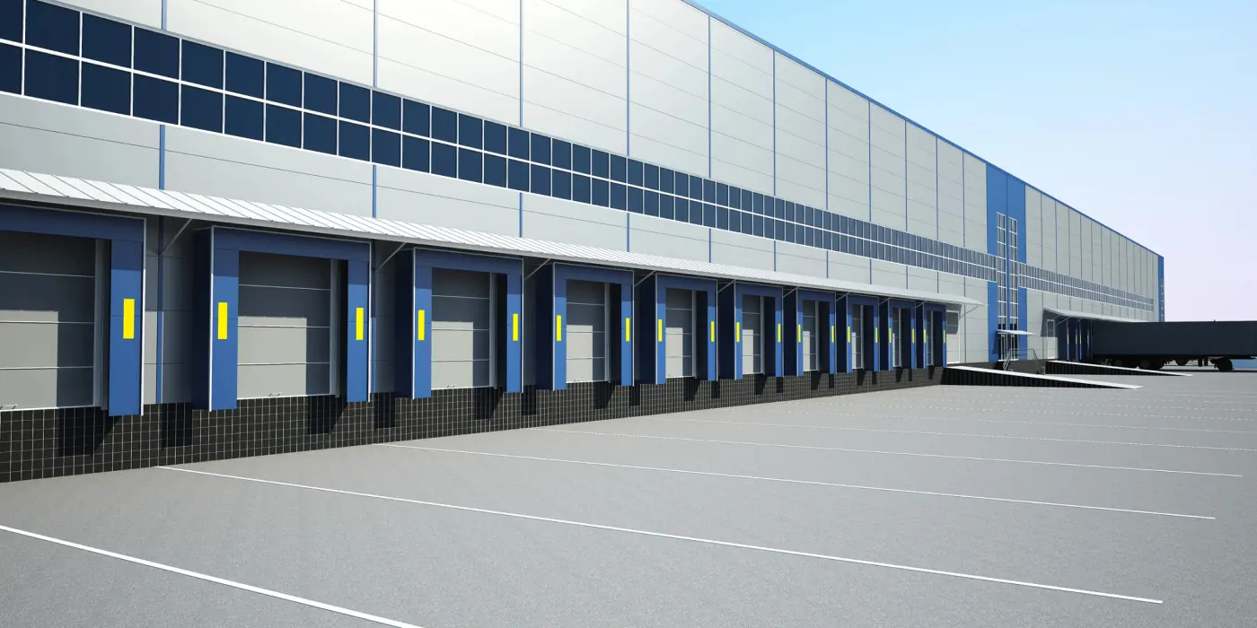 Large warehouse distribution center with loading docks for efficient 3PL network operations.